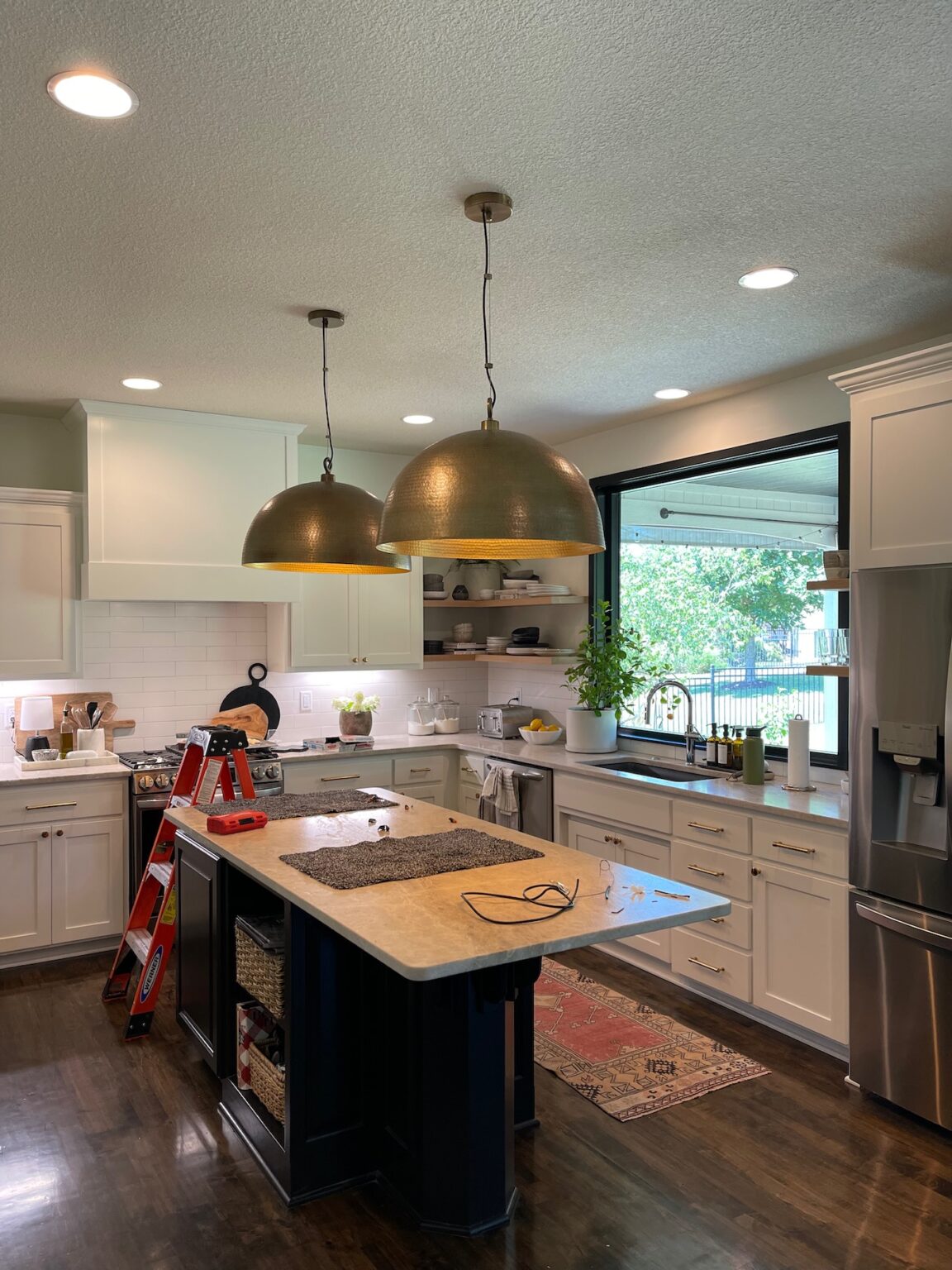 How to Use Oversized Brass Pendant Lights Over the Kitchen Island ...