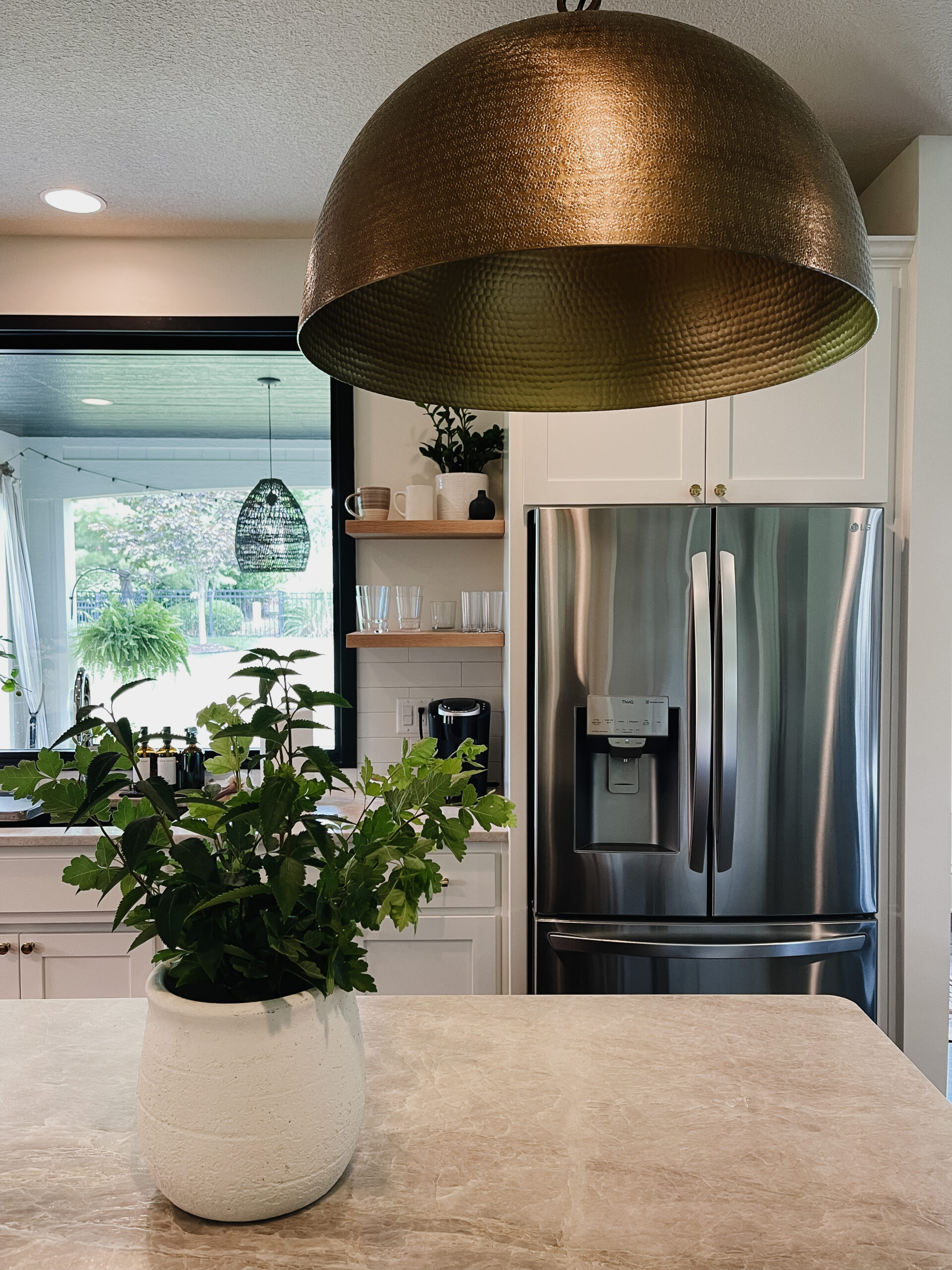 How to Use Oversized Brass Pendant Lights Over the Kitchen Island ...
